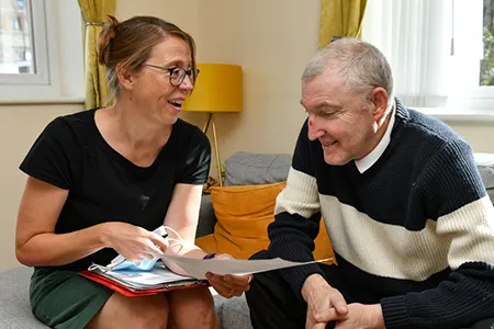 Fairoak housing support officer in conversation with a tenant
