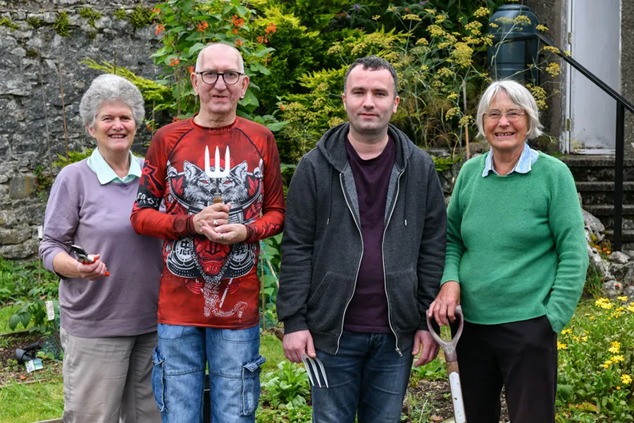 Fairoak-Tenants-Website-Home-900x600 Fairoak tenants and helpers in a garden in Kendal, Cumbria